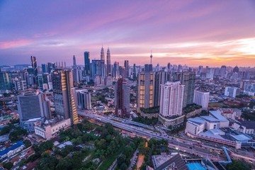 Kuala Lumpur city sunset with a to Petronas twin Tower