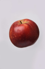 red glossy Apple isolated on white background