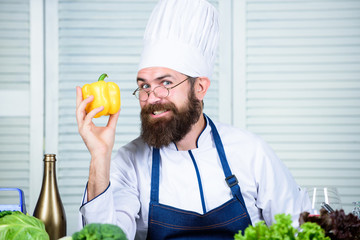 Vegetarian. Mature chef with beard. Healthy food cooking. Dieting and organic food, vitamin. Tasty fast food. Bearded man cook in kitchen, culinary. Chef man in hat. Secret taste recipe