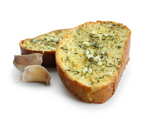 Tasty cut garlic bread on white background