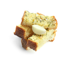 Tasty cut garlic bread on white background