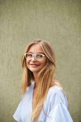 Fototapeta premium Young beautiufl woman smiling glasses, portrait