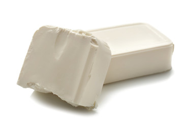 Tasty feta cheese on white background