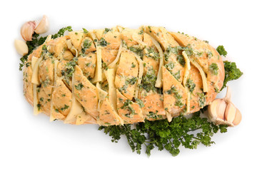 Tasty garlic bread on white background