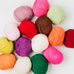 Colorful yarn for knitting on White background.