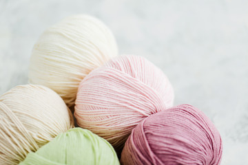 Yarn for knitting in pastel colors.