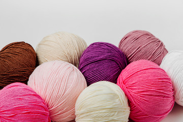 Colorful yarn for knitting on White background.