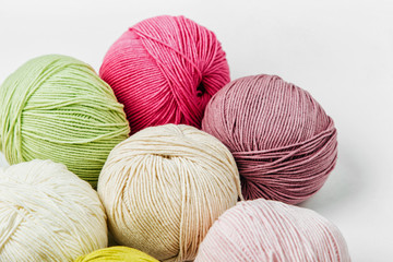 Colorful yarn for knitting on White background.