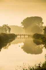 River in hazy morning light