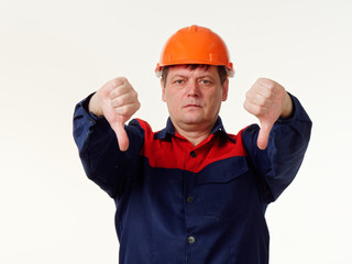 man in builder overalls on white background.