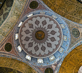 Fototapeta na wymiar Fragment of the ceiling painting of the Sultan Ahmed Mosque. Istanbul, Turkey