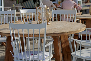 tables and chairs in the open air, cafe, restaurant