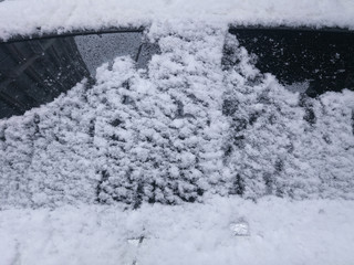 A snowy car