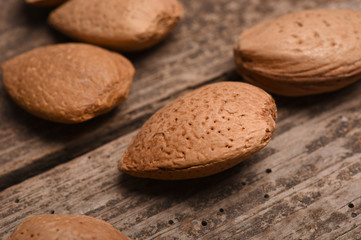 alamond on wood background