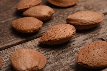 alamond on wood background