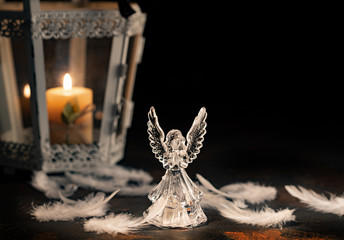Glass angel on a dark background