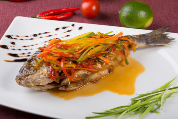Steamed dorado fish