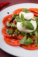 Italian burrata cheese served with sliced tomatoes