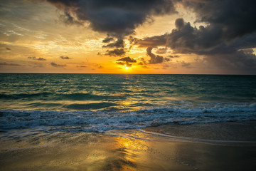 Fototapeta na wymiar Beautiful sunrise at the beach on Itamaraca Island - Pernambuco state, Brazil
