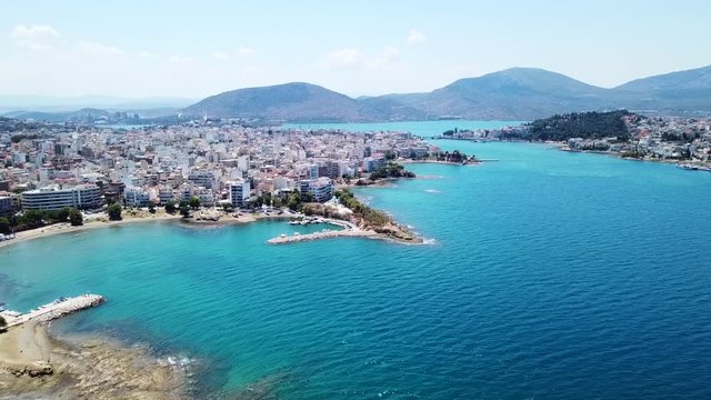 Aerial drone video of new famous public strait cable bridge of Halkida or Chalkida connecting mainland with Evoia island, Greece