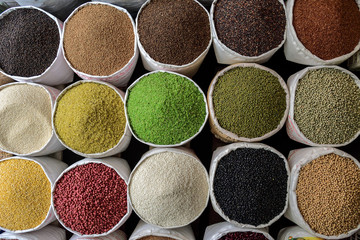 Bags of rice, beans and seeds on vietnameese market