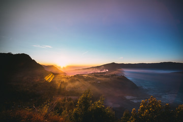 Mount Bromo, Indonesian: Gunung Bromo,  is an active volcano and part of the Tengger massif