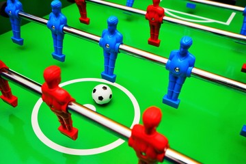 Table football with red and blue players