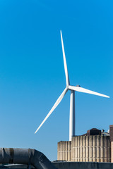 wind turbine against blue sky