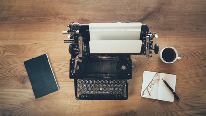 Retro writers desk with typewriter. Top view thirties. Author, writing, journalism concept