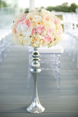 Beautiful vase of flowers wedding ceremony indoor