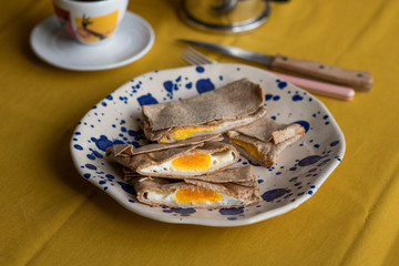 wholewheat breakfast tortilla, stuffed with ham, cheese and eggs