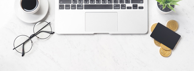 Business, accounting and payment concept financial information isolated on a modern marble office...