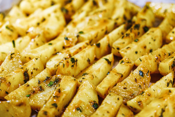 the Golden baked potatoes with herbs from the oven