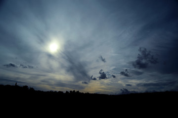 Fototapeta na wymiar Clouded sky with a smearing veil