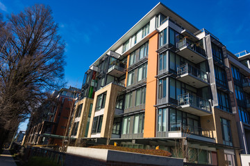 Low rise apartment building on sunny day in British Columbia, Canada