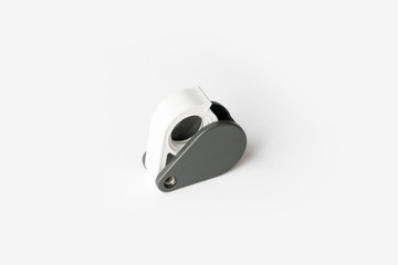 Magnifying glass for diamonds or see the amulet Isolated on a White Background.