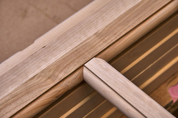 Wooden cabinet doors. Wooden frame. Home library with classic design. Wooden furniture manufacturing process