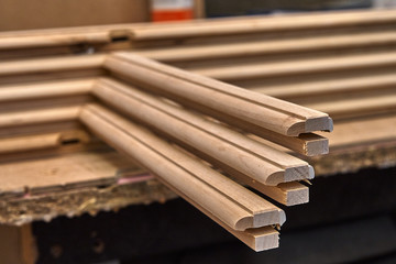 Wooden cabinet doors. Wooden frame. Home library with classic design. Wooden furniture manufacturing process