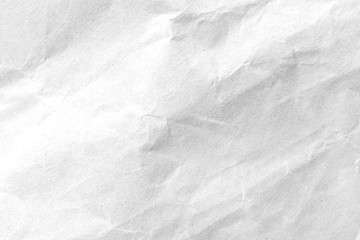 Obraz premium White crumpled paper texture background. Close-up.