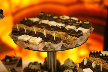 Delicious candy bar with macarons, cupcakes, cake pop and other sweets