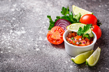 Fototapeta na wymiar Traditional mexican tomato salsa sauce