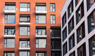 Modern and new apartment building. Multistoried, modern, new and stylish living block of flats. Real estate. New house. Newly built block of flats