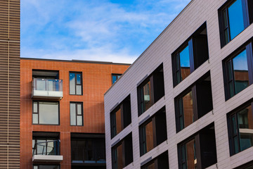Modern and new apartment building. Multistoried, modern, new and stylish living block of flats. Real estate. New house. Newly built block of flats