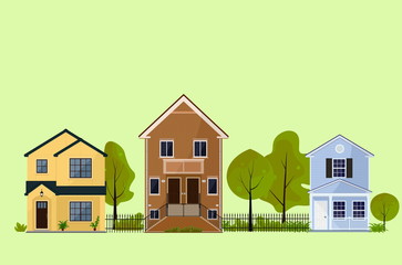 City houses and green trees front view