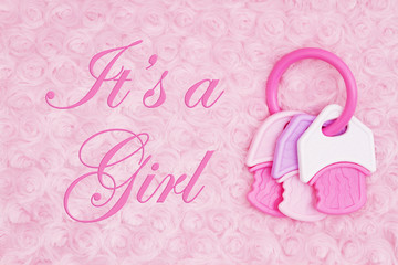 It's a Girl message with a teething ring on pale pink rose plush fabric