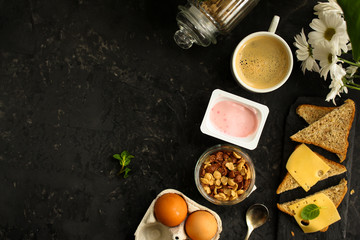 breakfast or snack (coffee, yogurt, cheese, sandwiches, cornflakes and more). Food background.