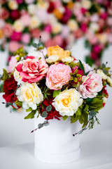 close up of summer bouquet of flowers over colorful background