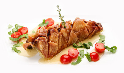 Fried pike perch with sauce and cherry tomatoes. On white background.