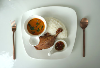 Deep fried duck leg with Thai style red curry serving with white rice