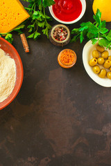 set ingredients are dough and filling, sauce (flour, olives, greens, and more). food background. copy space